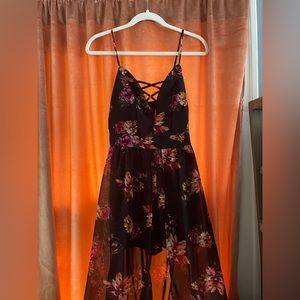 Black and floral romper with train